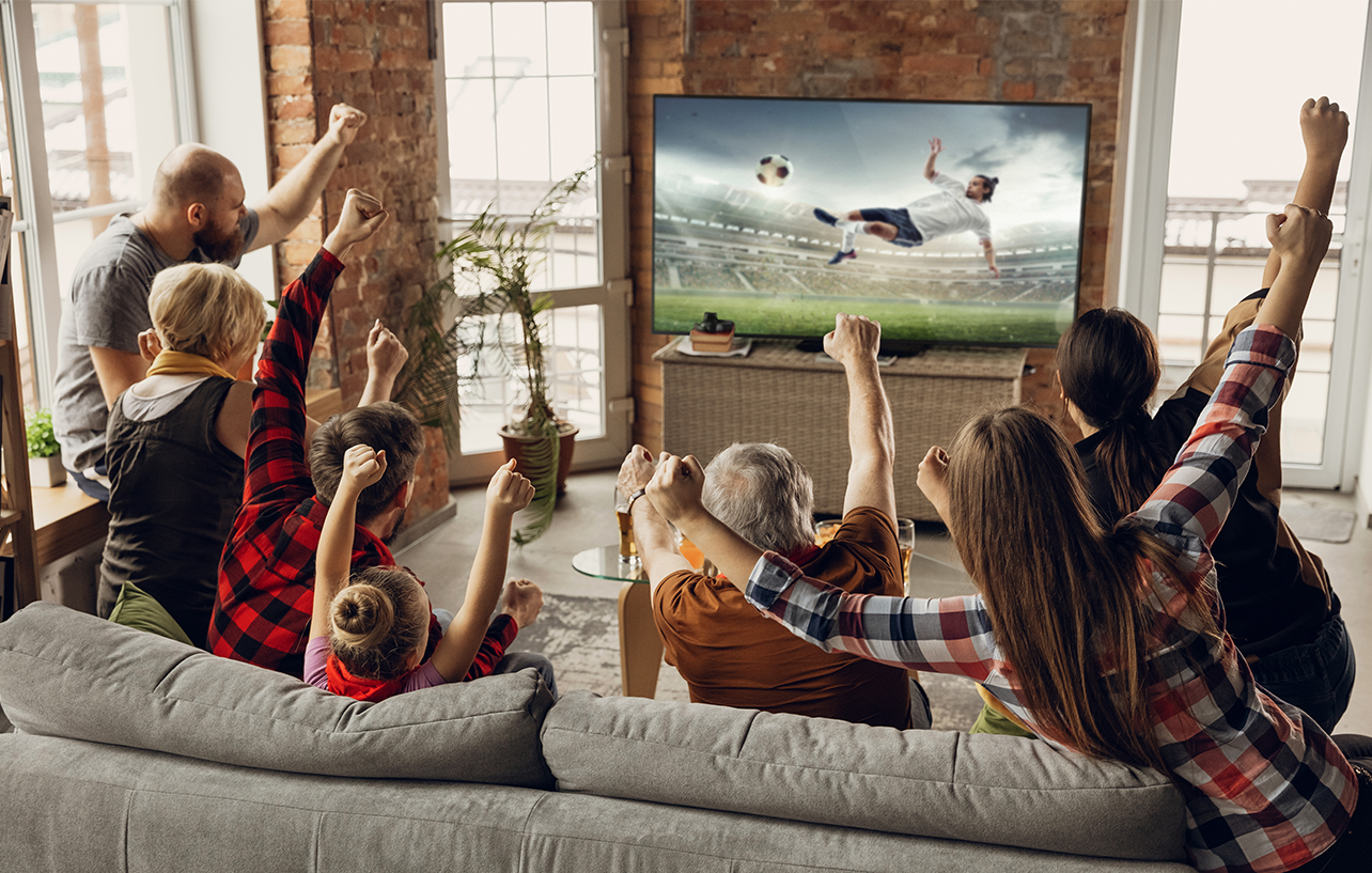 Family watching IPTV sports together