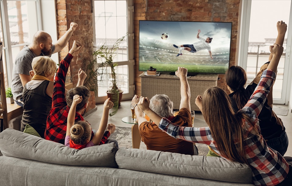 Family watching IPTV sports together